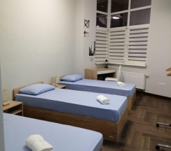 Кровать в 3-местном общем женском номере в Эдем
