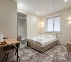 Улучшенный двухместный с 2 кроватями и 1 большой в Nogaev Hotel