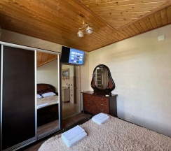 Многоместный смешанный номер Двухкомнатный люкс с кухней 10 в Счастливый слон