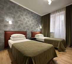 Номер стандарт с 2 односпальными кроватями с балконом в Альпина