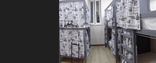 Кровать в 8-местном общем номере в Рус