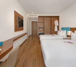 Трёхместный номер Deluxe с балконом и с видом на город в Gold Plaza Hotel Da Nang