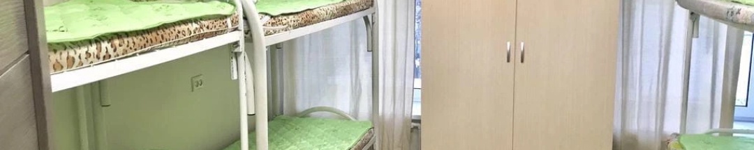 Кровать в общем номере (общая ванная комната) в Ромашка
