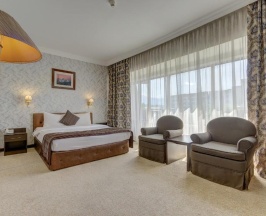 Двухместный номер Standard с балконом двуспальная кровать в Премьер Алатау