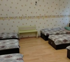 Кровать в общем номере в Центральный