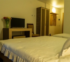 Трехместный стандартный номер на двух-трех гостей с балконом и видом во двор(Корпус Б) в Оптимист