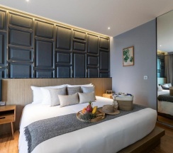 Двухместный номер Deluxe с видом на бассейн двуспальная кровать в Отель Wyndham Grand Nai Harn Beach Phuket