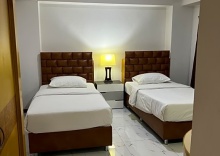 Семейный люкс с 2 комнатами в Mall Suites Hotel