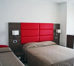Четырёхместный номер Standard с балконом в Hotel Buratti