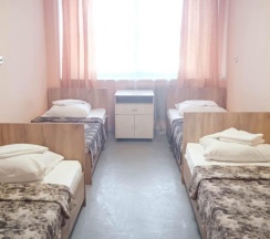 Кровать в 4-местном общем номере в Smart Hotel KDO Пенза