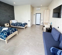 Комфорт с видом на море и балконом (twin+Extra Bed) в Costa d`Ora