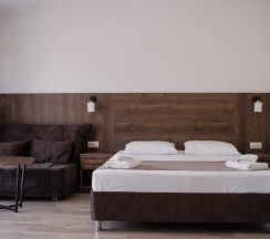 Трёхместный номер Deluxe с красивым видом из окна в Талион