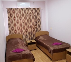 Номер стандарт с 2 односпальными кроватями в Импульс