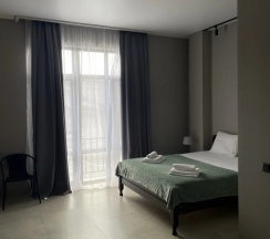 Двухместный люкс с балконом и с видом на горы двуспальная кровать в Maximus