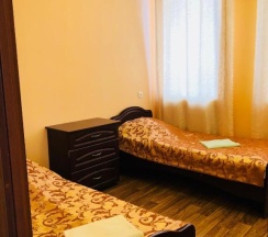 Номер эконом с 4 односпальными кроватями в Планета