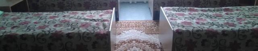 Кровать в 4-местном общем номере в Три охотника