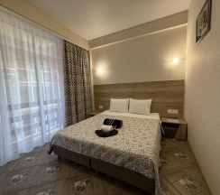 4-местная комната делюкс с балконом в Отдых.23