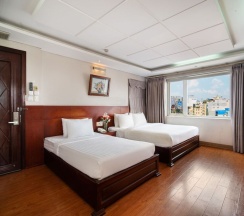 Трёхместный номер Deluxe в Van Ha Hotel