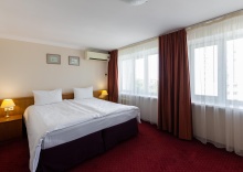 Номер полулюкс с 2 односпальными кроватями в AZIMUT Сити Отель Уфа