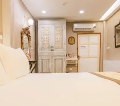 Двухместный полулюкс двуспальная кровать в Chuchai Buri Sri Amphawa