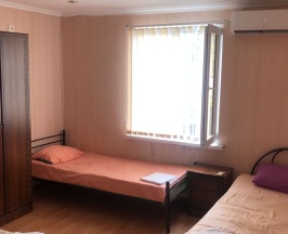 Четырехместный номер с 1 двуспальной или 2 односпальными кроватями в Саучи