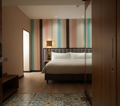 Двухместный люкс двуспальная кровать в Отель Ramada Encore by Wyndham Tashkent