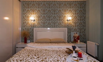 Четырёхместные апартаменты c 1 комнатой с балконом и с видом на город в Апартаменты Афина Паллада