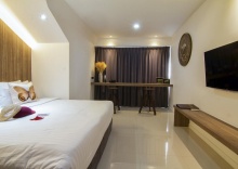 Двухместный номер Standard с видом на сад двуспальная кровать в Bossotel Chiang Mai