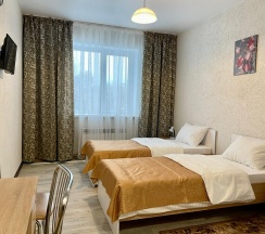 Номер стандарт с 2 односпальными кроватями в Long House