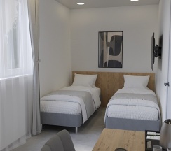 Стандартный номер с двумя односпальными кроватями в Holiday House