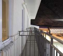 Номер стандарт с 2 односпальными кроватями с балконом в Альпина