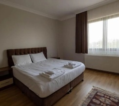 Вилла с 4 комнатами с балконом в Guzel Evler Family Resort
