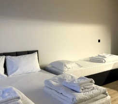 Трёхместные апартаменты c 1 комнатой с красивым видом из окна в Квартира 3-местный Апарт Гарантия Prime
