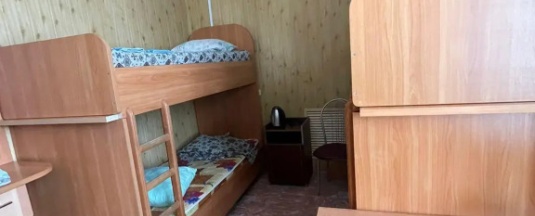 Кровать в общем номере (общая ванная комната) в Малахит