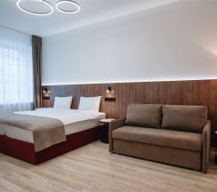 УЛУЧШЕННЫЙ с 1 кроватью и диваном в Amati Kazan