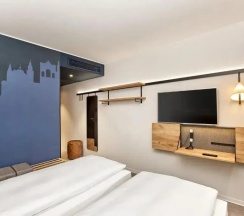 Двухместный номер Comfort 2 отдельные кровати в H2 Hotel München Olympiapark