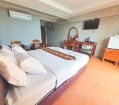 Двухместный номер Standard с балконом двуспальная кровать в Jirawan Hotel