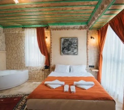 Двухместный люкс двуспальная кровать в La Casa Cave