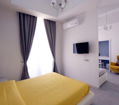 Четырёхместный номер Deluxe в Rome Together Guest House