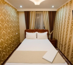 Четырёхместный люкс Двухкомнатный в Salut Hotel Almaty