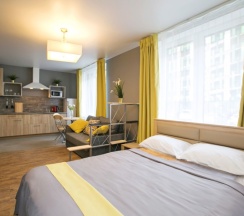 Просторная студия Honey с двумя окнами в New Horizon Ovechkin Apartments