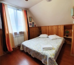 Четырехместный номер с 2 двуспальными кроватями в Колесо