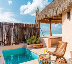 Номер Plunge Pool oceanfront в Shangri-la Caribe Beach Village Resort