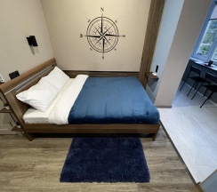 Номер делюкс семейный с 1 односпальной и 1 двуспальной кроватью (с балконом) в Pallada