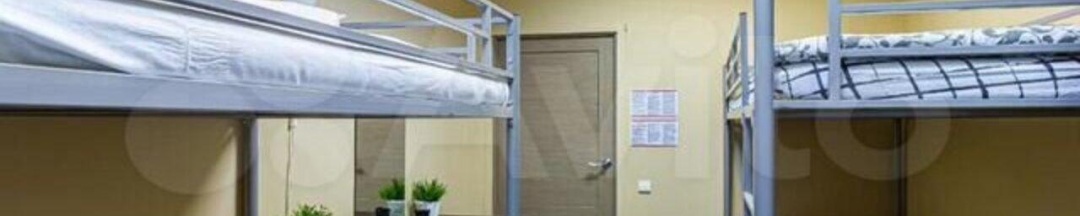 Кровать в 4-местном общем мужском номере в Аврора