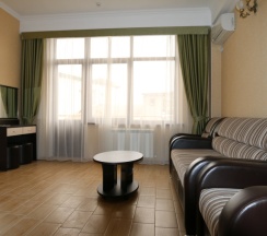 Двухместный люкс с 2 комнатами с балконом двуспальная кровать в Олимпия