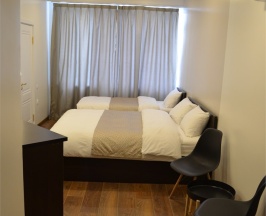 Стандарт трехместный с двуспальной и односпальной кроватью в Vladi Stay