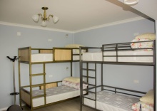 Кровать в общем номере в Guest House Meyman