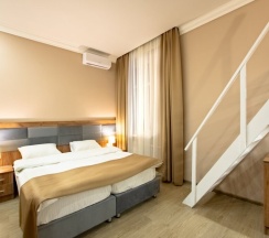 Четырёхместная семейная номер-студия Deluxe в Ботанический сад