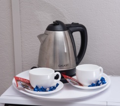 Двухместная комната с 2 односпальными кроватями и общей ванной комнатой в МК Мокко